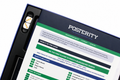 Close-up of a printed poster or game board insert titled "POSTERITY" with financial game instructions, shown inside a dark blue frame with two white dice visible on the left.